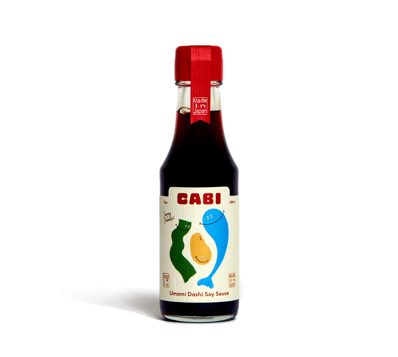 Cabi Umami Dashi Soy Sauce bottle made in Japan, featuring illustrated label with playful characters on cream packaging.